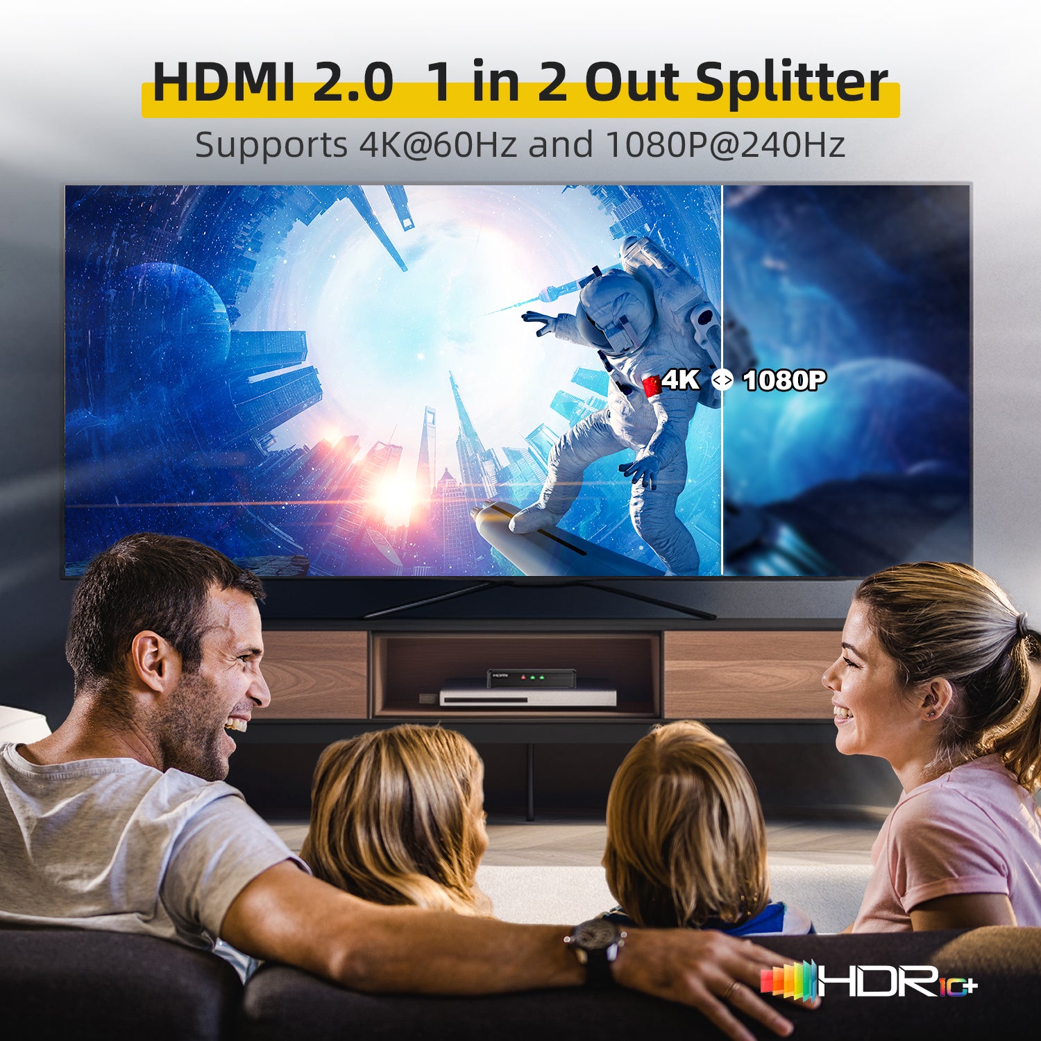 Family watching a space-themed movie on a large screen TV with an HDMI splitter in the foreground.